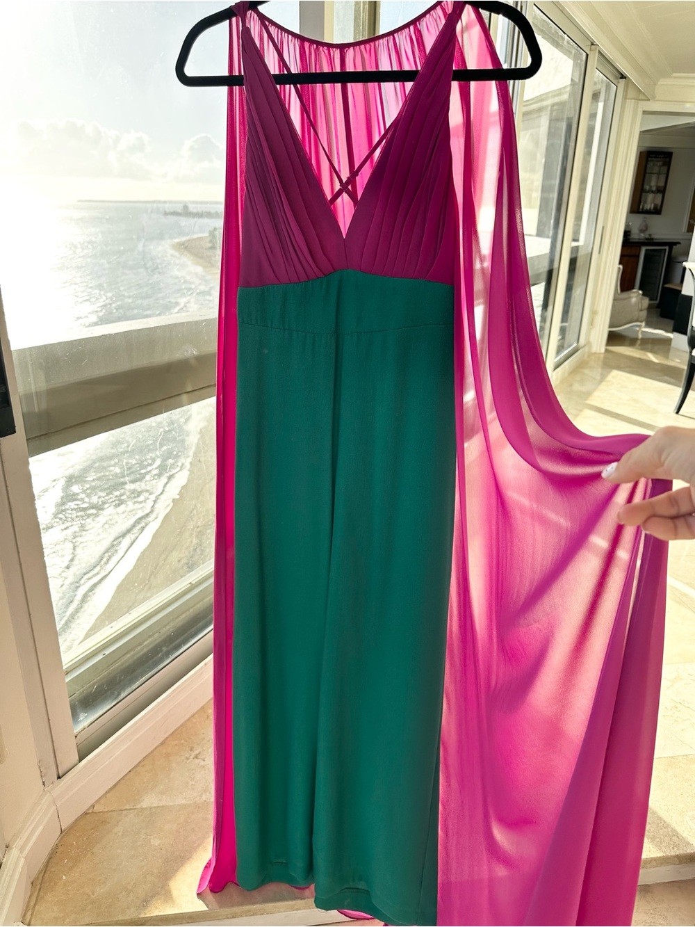 Elegant jumpsuit with cape.